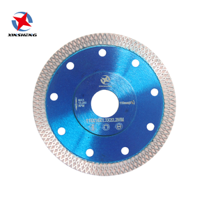 Lame de scie diamantée XINSHENG à bord en maille et moyeu surélevé, haute dureté, 115*10*1.2*22.2mm, pour la découpe de dalles - Product Image 1