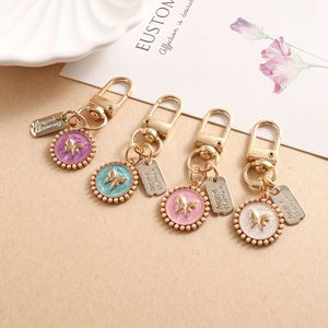 Nouveau <span class=keywords><strong>porte</strong></span>-clés en forme d'arc, étui de protection pour écouteurs Bluetooth, boîte à bijoux, pendentif, petit cadeau <span class=keywords><strong>porte</strong></span>-clés - Product Image 2