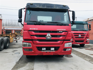 รถบรรทุกหัวลากมือสอง Sinotruk Howo NX 6x4 แบบหลังคาเรียบ พวงมาลัยซ้าย เครื่องยนต์ดีเซลยูโร 2 กำลัง 351-450 แรงม้า รับน้ำหนัก 31-40 ตัน เครื่องยนต์ Weichai สำหรับงานหนัก - Product Image 1