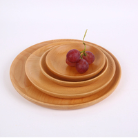 Assiettes rondes en bois personnalisables, fabriquées en bois massif pour placer gâteaux et pains dans la cuisine du restaurant