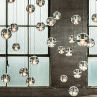 Lustre LED moderne en verre ovale sur base carrée en acier inoxydable, suspension spirale de luxe pour villa et hall d'hôtel