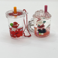 Porte-clés liquides de Noël multi-styles : tasses de thé au lait, flotteurs Père Noël et bonhomme de neige, pendentifs mignons à sable mouvant