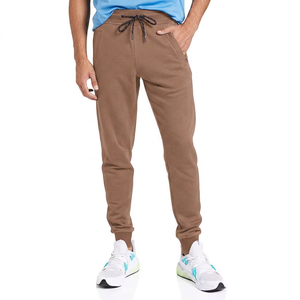 Pantalon de sport en coton doux pour homme, style actif, avec logo et design personnalisés, coupe jogger à revers élastiques. - Product Image 1
