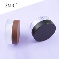Boîtier à poudre rond avec 3 compartiments, fond transparent givré, couvercle brun peint par pulvérisation, vide pour 3 teintes de poudre libre fixatrice