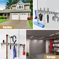 Organisateur de porte-outil en plastique mural multifonctionnel domestique local pour balai de vadrouille de Garage et outils de jardinage