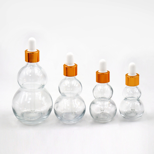 Bouteilles en verre compte-gouttes transparentes ambrées brillantes en forme de cantaloup de 15 ml, 20 ml, 30 ml, 50 ml pour huiles essentielles - Product Image 4
