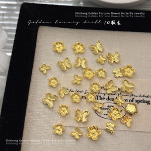 Paso Sico 10 pièces/sac Décoration d'ongles 3D en alliage doré de luxe, 4 motifs (fleurs, papillons) pour femmes - Product Image 3