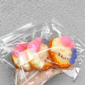 ของเล่นบีบลดความเครียดรูปแมวทาร์ต TPR Taba Squishy ของเล่นยอดฮิตใน TikTok ทำจากวัสดุ TPR ของเล่นบีบคลายเครียดรูปอาหาร - Product Image 4