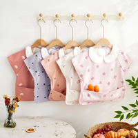 Bavoir bébé sans manches imperméable à boutons-pression, résistant à l'huile, pour la vente en gros