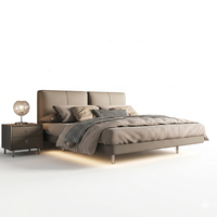 Lit double king size moderne et minimaliste en cuir véritable avec cadre en métal haut de gamme et rembourrage luxueux pour chambre principale