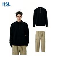Pull tricoté noir uni décontracté pour homme, col montant à demi-zip, idéal pour les sorties, le street style et les tenues d'automne