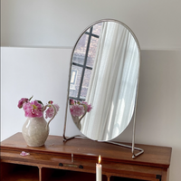 Vente en gros vanité de table élégante et moderne luxe miroir de maquillage ovale cosmétique en métal doré décoration pour la chambre à coucher