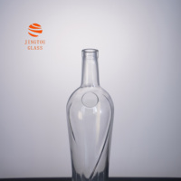 Bouteille à spiritueux en verre clair personnalisée de 700 ml, forme incurvée unique, bouteille en verre pour la vodka, le brandy, le whisky
