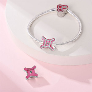 12 abalorios con símbolos del zodiaco, de cobre plateado con esmalte rosa y circonitas, para pulseras DIY, regalo, joyería DIY - Product Image 4