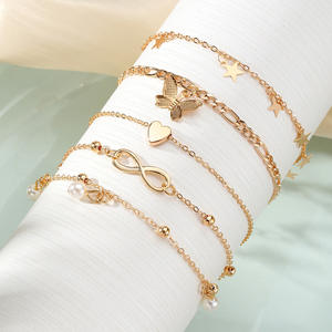 Lot de 4 Bracelets de Cheville Tendance en Alliage Doré avec Perles d'Imitation, Breloques Papillon et Cœur, Superposés, Bijoux de Fête pour Femme, Nouveauté 2024 - Product Image 4