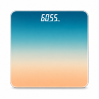 Balance numérique moderne à dégradé bleu-orange avec écran LED dissimulé en verre trempé pour un système de pesée personnel précis à domicile