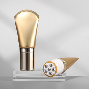 Tube en plastique vide de 100 g avec finition dorée de qualité supérieure et design personnalisable, avec rouleau de massage à 5 billes, emballage cosmétique - Product Image 1