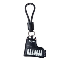 Porte-clés mignon mini piano et violon en cuir PU, breloques de sac, pendentif instrument de musique pour couple, porte-clés de voiture, cadeau tendance, vente en gros