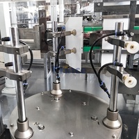 Machine de remplissage et de scellage automatique de poudres et granulés pour cartons, capsules de café, lait et détergent