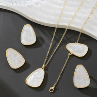 Ensemble de bijoux pour femmes à motif ovale géométrique léopard blanc pour mariages et fêtes, fabriqué en feuille acrylique et en alliage