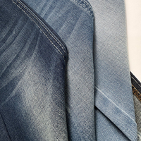Tissu denim de haute qualité 10 OZ, sergé mercerisé, non extensible, denim brut tissé pour la production en série de vêtements