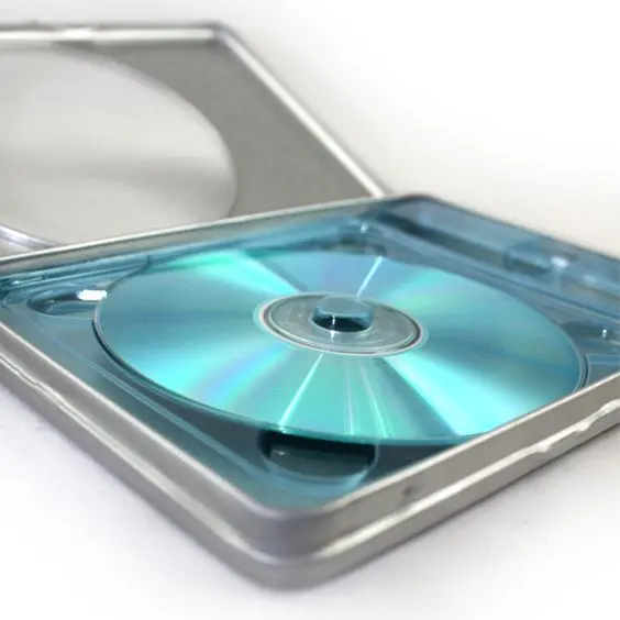 Изготовленная на заказ печатная жестяная коробка CD DVD с плоским шарнирным тиснением Серебряная лента CD DVD VCD металлическая жестяная коробка