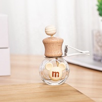 Nouveau design mignon 10ml verre diffuseur de voiture bouteille désodorisant rond dessin animé sortie d'air parfum bouteille en verre décoration de voiture