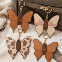 Porte-clés en cuir papillon vintage personnalisé OEM ODM, découpé, avec surpiqûres renforcées pour un maintien optimal