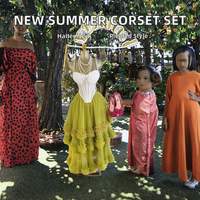 Ensemble deux pièces pour femme avec logo personnalisé, corset irrégulier, jupe longue à volants superposés, streetwear décontracté d'été