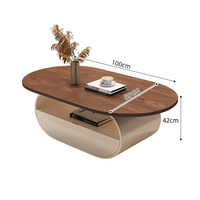 Table basse ovale rétro de style mid-century avec structure en métal, plateau en verre, design moderne minimaliste, luxe décoratif, petite table pour salon