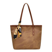 Nouveau sac fourre-tout tendance pour femme, grande capacité, couleur unie, à porter à l'épaule ou sous le bras, style simple et élégant pour l'automne