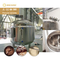 Machine de remplissage de liquides semi-épais (miel) avec réservoir de mélange de 1000 L et système de pesage à double tête