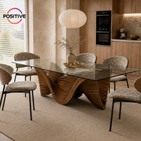 Table à manger en bois massif Wave avec plateau en verre trempé, base en bois sculpté, mobilier de salle à manger de luxe pour villa