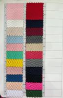 ANONO Lot de surplus de haute qualité Jacquard Polyester Spandex tricoté teint en rouleau pour vêtements de sport Tissus textiles