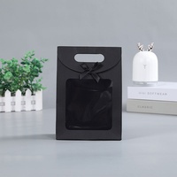 Sac cadeau personnalisé blanc noir ouverture rabat nœud boucle kraft sac d'emballage en papier scellé avec fenêtre transparente