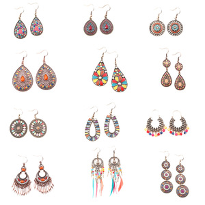 Pendientes étnicos hechos a mano de metal, largos, con borlas florales y cuentas, accesorios de moda para el estilo de vacaciones de primavera y verano. - Product Image 5