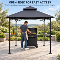 Abri de cuisine extérieure avec grill, auvent à double niveau et comptoirs de préparation latéraux pour la cuisson dans le jardin ou sur la terrasse