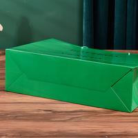 Sac shopping en papier couché vert avec logo personnalisé et ruban gros-grain, matériaux recyclés, sac cadeau de luxe pour bijoux, chaussures et vêtements