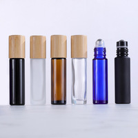Vente en gros de flacons à bille en verre transparent pour huiles essentielles, rechargeables, avec bouchon en bambou naturel, 5 ml, 10 ml