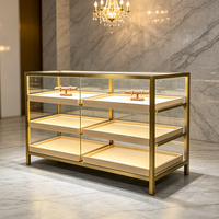 Meubles de magasin de détail sur mesure de luxe, comptoir d'exposition en verre trempé éclairé par LED pour les boutiques de centres commerciaux