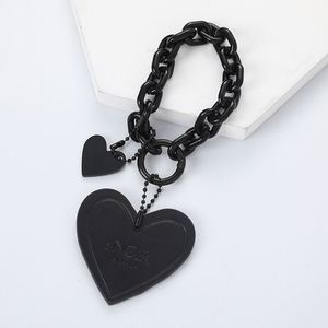 พวงกุญแจหนังรูปหัวใจแบบขายส่ง ปรับแต่งได้ พร้อมโลโก้ส่วนตัว - Product Image 3
