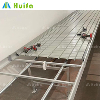 HUIFA 4x8 plateau complet de banc de roulement de flux et de reflux hydraulique avec la roue universelle pour les usines médicales