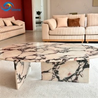 Table basse ronde de luxe en marbre italien Calacatta Viola avec pieds en dalle et bord incurvé pour salon et projets de villas