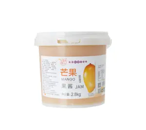 Pulgares hacia arriba de mango fresco jugo concentrado para untar en pan o bebidas elaboradas con deliciosa mermelada de fresa