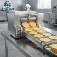 Machine à tortillas pour la préparation de tortillas de maïs, de tortillas de farine, de chapatis, de rotis, de pitas et de pains plats