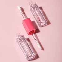 Tube de brillant à lèvres à double extrémité avec baguette Logo personnalisé Récipient de glaçage à lèvres vide rechargeable pour emballage cosmétique DIY