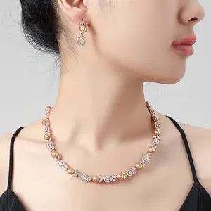Set di gioielli all'ingrosso di 2023 qualità di fabbrica in rame pieno trapano collana di perle orecchini AAA zirconi due pezzi Set