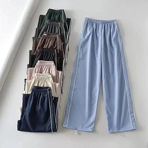 <span class=keywords><strong>Pantaloni</strong></span> Larghi da Donna Neri con Elastico in Vita e Strisce Laterali Bianche, Stile Casual per Streetwear - Product Image 4