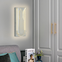 Applique murale LED en aluminium et acrylique, design floral à lignes croisées, avec gradation trois couleurs, pour éclairage décoratif de chambre et d'hôtel