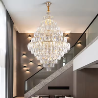 Lustre en cristal long en métal de luxe pour salon et villa, design moderne, vente chaude, pour escalier décoratif et plafond haut